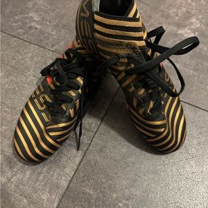 Nemeziz Black and Gold Striped Soccer Cleats